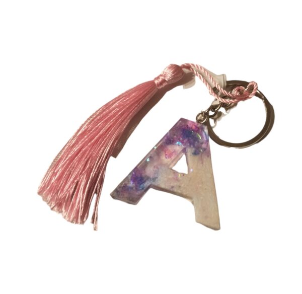 LLaveros personalizable, letras, colores y acabados diferentes con borla.